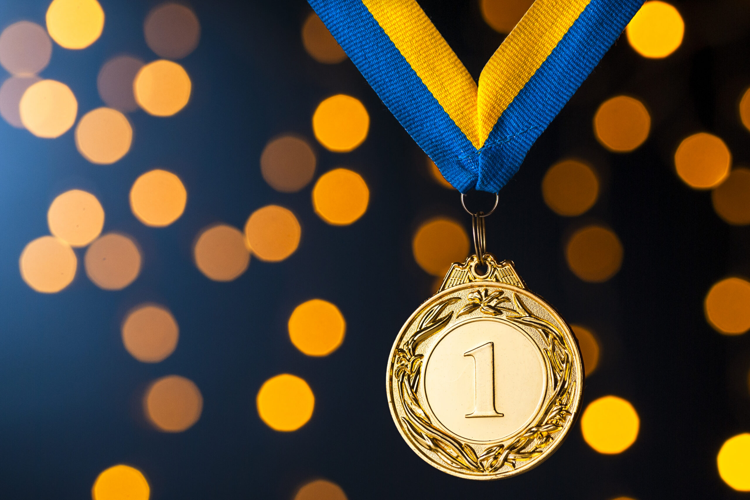 Gold champion or winners medallion on a ribbon