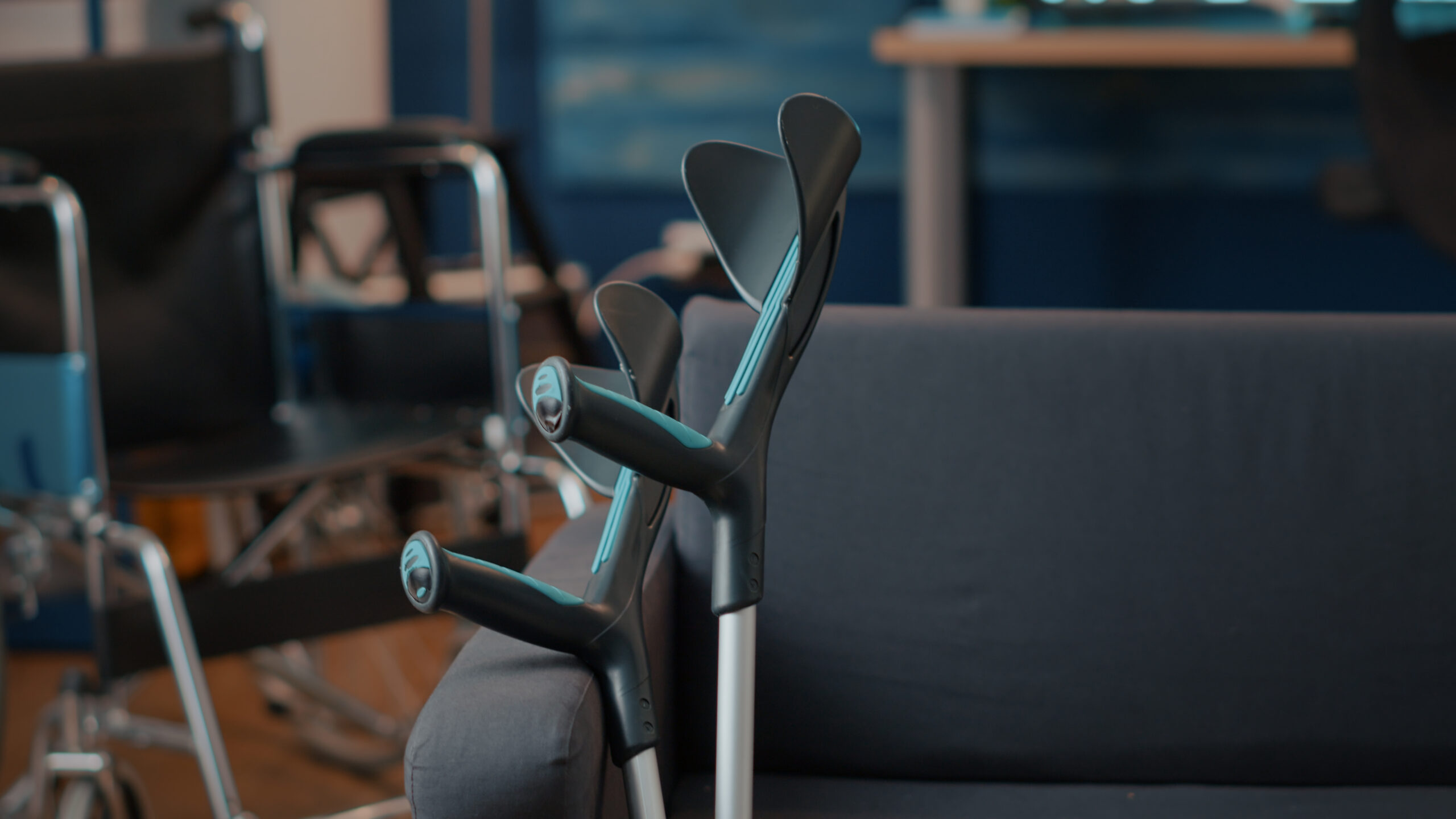 crutches-and-wheelchair-resting-in-waiting-room-2026-03-19-02-07-50-utc